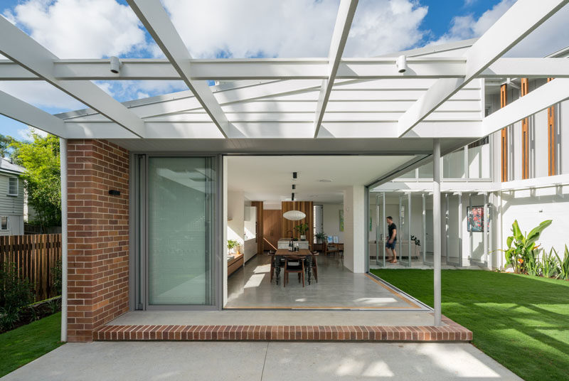 Kelder Architects Have Designed A House That Opens To A Courtyard With A BBQ Terrace, A Grassy Lawn, And A Pool