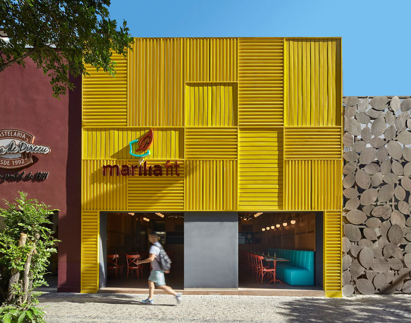 The Facade Of This New Restaurant Is A Bold Grid Of Yellow Aluminum