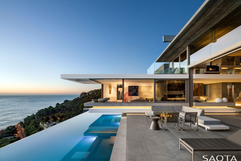 SAOTA have recently completed their latest project, a modern multi-storey house that sits perched on the shoulders of Lion’s Head in Cape Town, South Africa. #ModernHouse #HouseDesign #ModernArchitecture #SwimmingPool