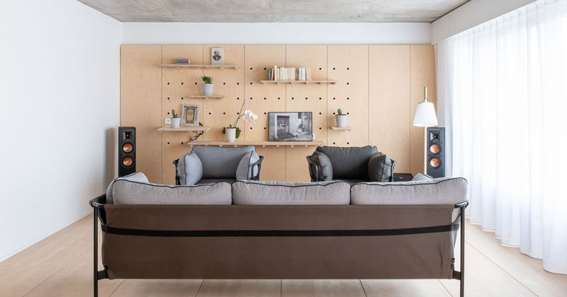 Design Detail ? Peg Board Walls Have Been Used To Create Flexible Shelving In This Apartment