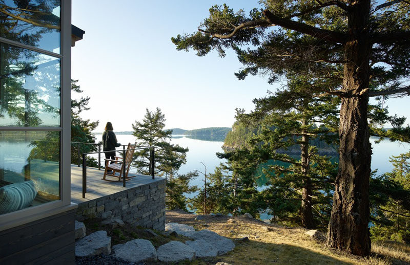 This modern house has a deck that provides expansive views of Puget Sound. #Architecture #HouseDesign