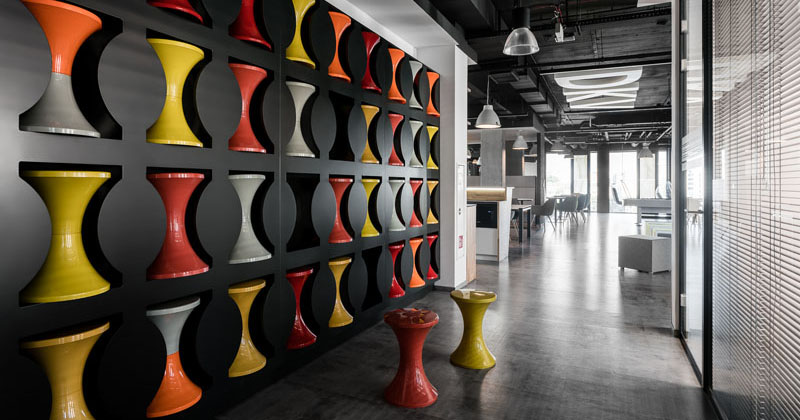 Design Detail A Wall In This Office Was Used To Create Stool Storage
