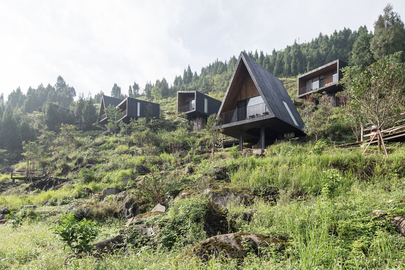 A collection of modern holiday cabins in Guizhou, China, surrounded by farmland, have been designed with shou sugi ban (blackened wood) facades. #Cabins #Hotel #Architecture