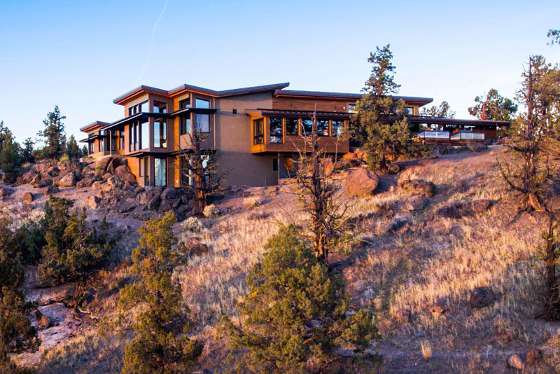 Nathan Good Architects has designed a new contemporary house that's nestled into a bluff above the scenic Deschutes River in Central Oregon. #ModernHouse #ModernArchitecture #HouseDesign