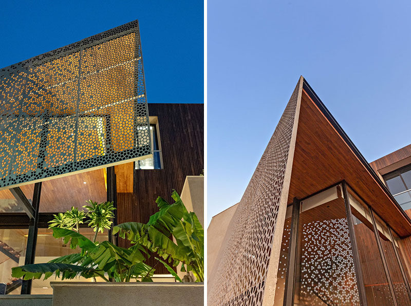 This modern house features a large decorative screen that provides privacy for the interior without blocking the natural light. #PrivacyScreen #Architecture