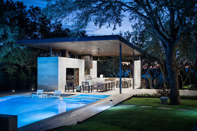 This Poolside Living Room And Kitchen Sits Under A Large Floating Canopy