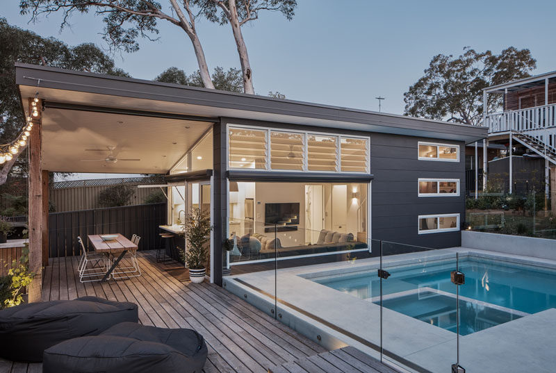 A bare backyard was transformed into a new small house with a pool for a family of four. #SmallHouse #SwimmingPool #TinyLiving