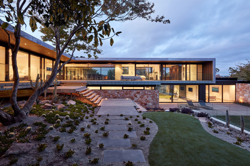 Walls Of Windows Allow This Home To Be Filled With Natural Light