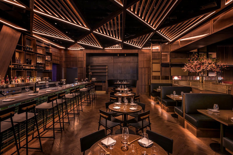 DesignAgency has collaborated with with Momofuku, to completed K?wi, their latest restaurant, located in Hudson Yards, New York. #RestaurantDesign #BarDesign