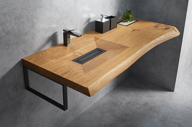 This Wood Vanity Has A Carved Out Sink And A Built-In Sunken Planter