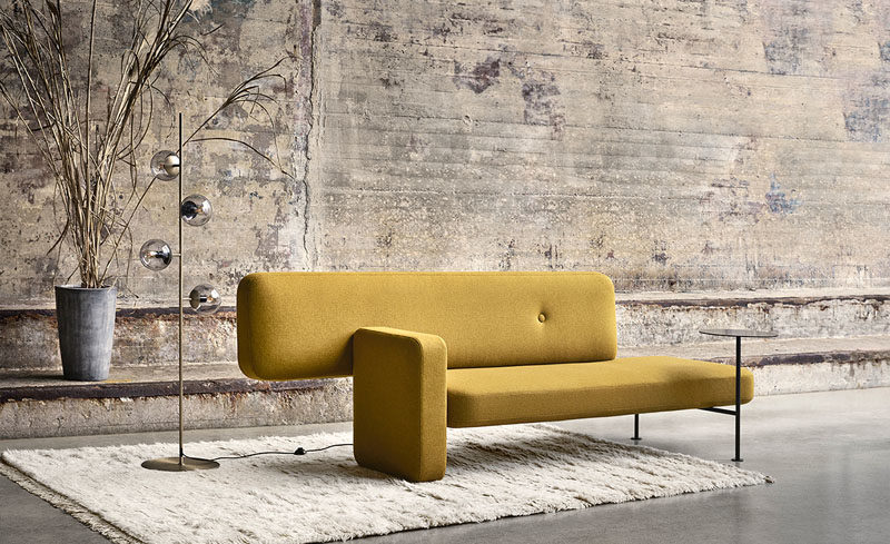 Spanish architect Santiago Bautista, has recently created Pebble, a modern couch with a built-in side table and an asymmetrical design. #ModernCouch #ModernFurniture #Seating