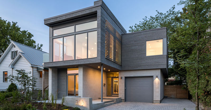 Honed Concrete-Block Walls And Grey-Stained Cedar Siding Are Showcased