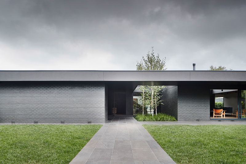 Black Brick Is Featured Throughout This Modern Australian House