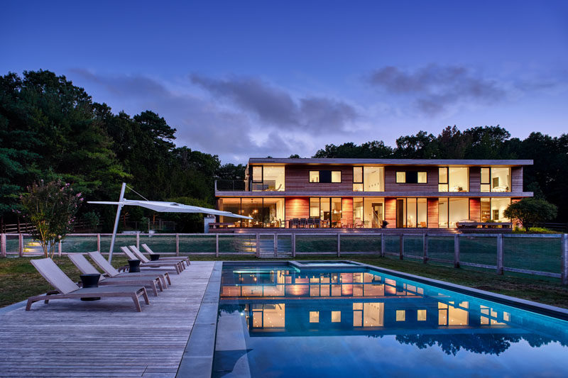 This Hamptons House Opens Up To An Expansive Yard With A Swimming Pool