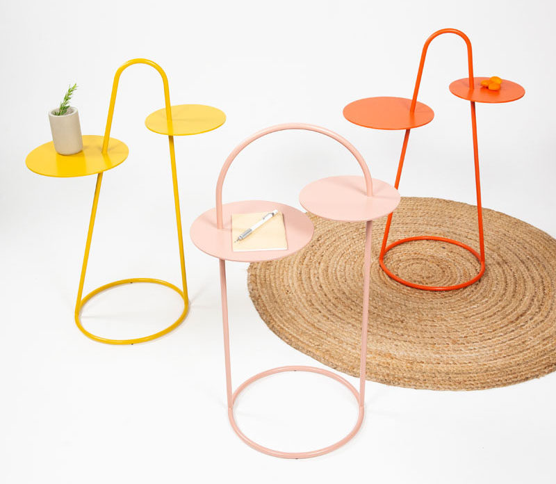 The Duet Side Table Has Two Surfaces Connected By A Curved Frame
