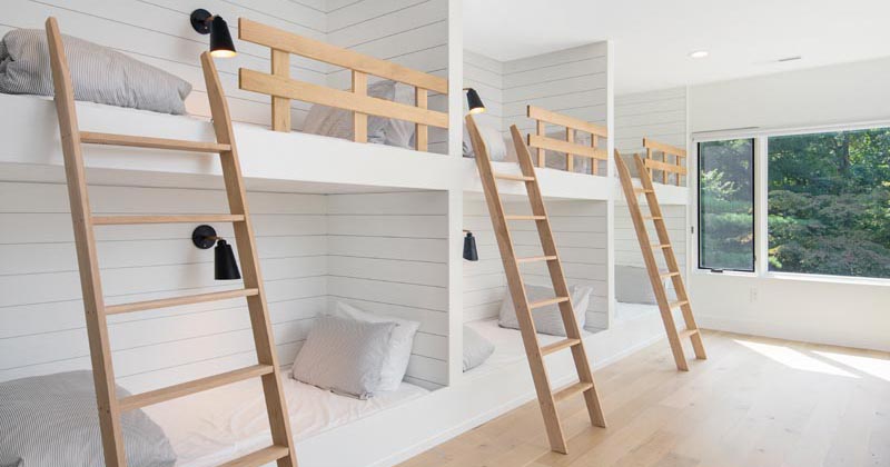 multiple bunk beds in a room