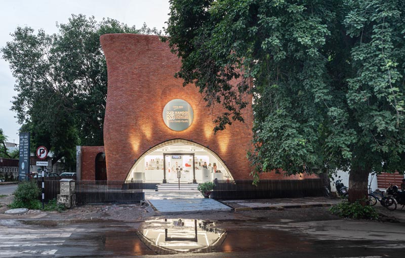 A Sweet Shop With A Curvaceous Brick Facade