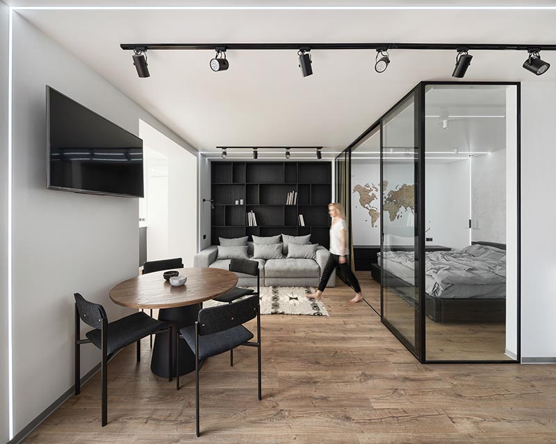 A Glass Enclosed Bedroom Creates A Slightly Separate Space Inside This Small Apartment