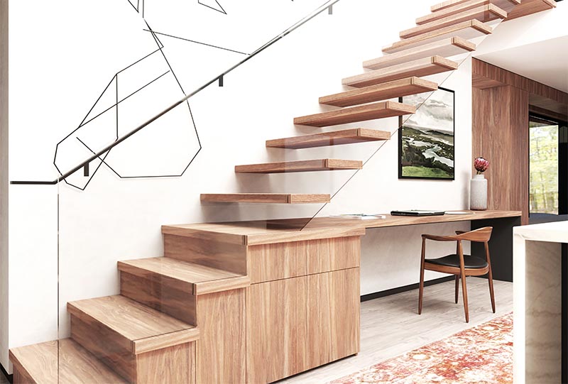 Instead of having an empty unused space under these modern stairs, the designers combined the stairs, desk, and storage all together, creating a cohesive and useful space. #StairDesign #HomeOffice #BuiltInDesk #ModernStairs