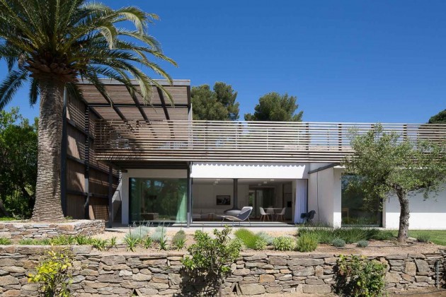 This home has a living area that opens up to the outdoor patio.