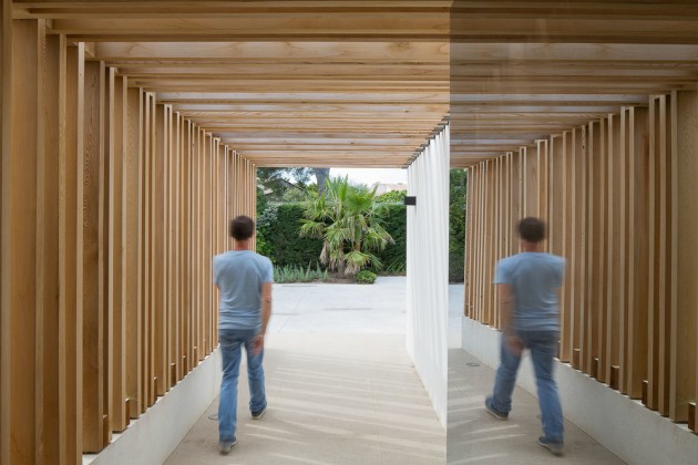 This entryway is covered in wood.