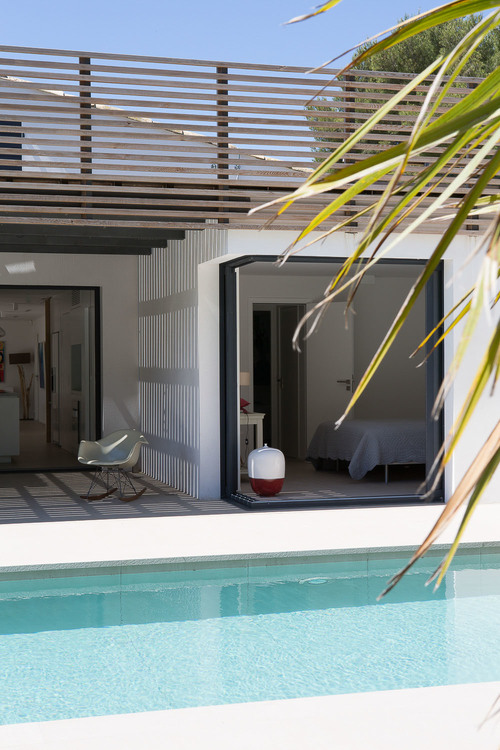 This bedroom opens up directly to the pool area.