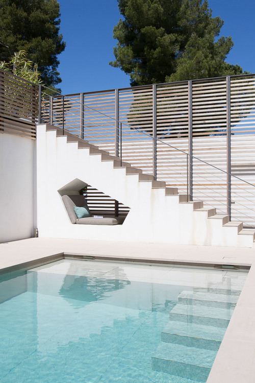 This built-in seating nook by the swimming pool of a house in Saint Tropez.