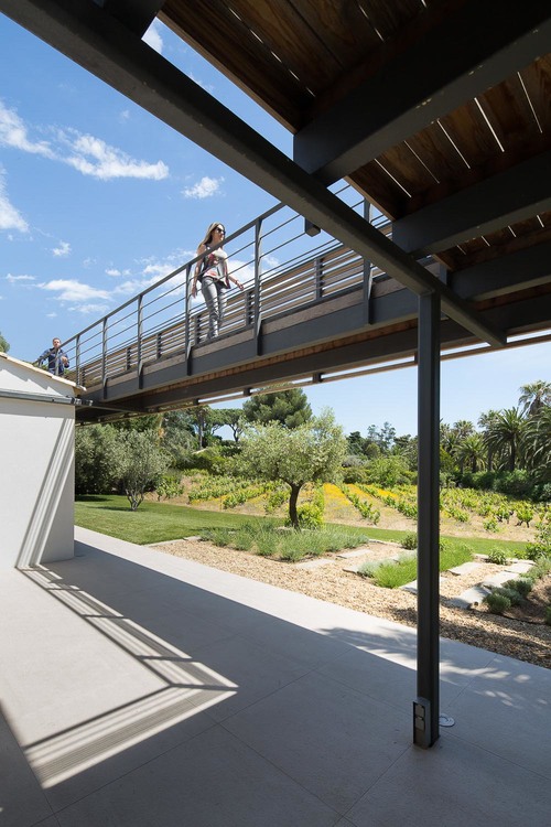 This home has a outdoor walkway connecting various parts of the home.