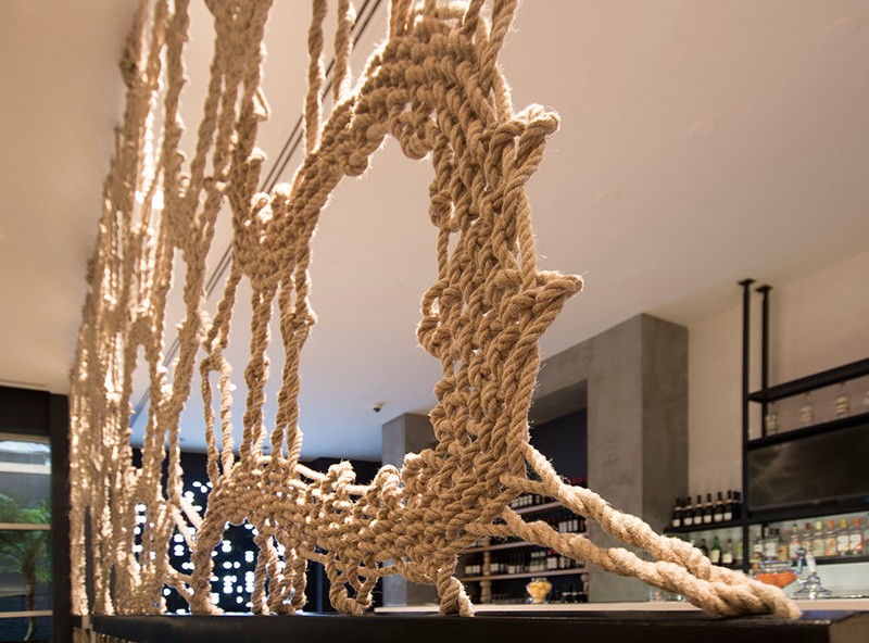 MANTZALIN have designed a rope screen for Stix, a new Mediterranean restaurant in Chelsea, New York. #RopeScreen #RestaurantDesign #RestaurantInterior #Rope #InteriorDesign