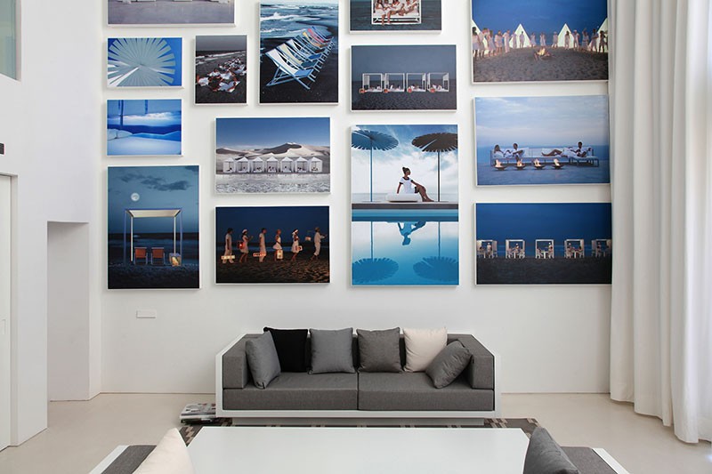 A Wall Of Illuminated Backlit Photos