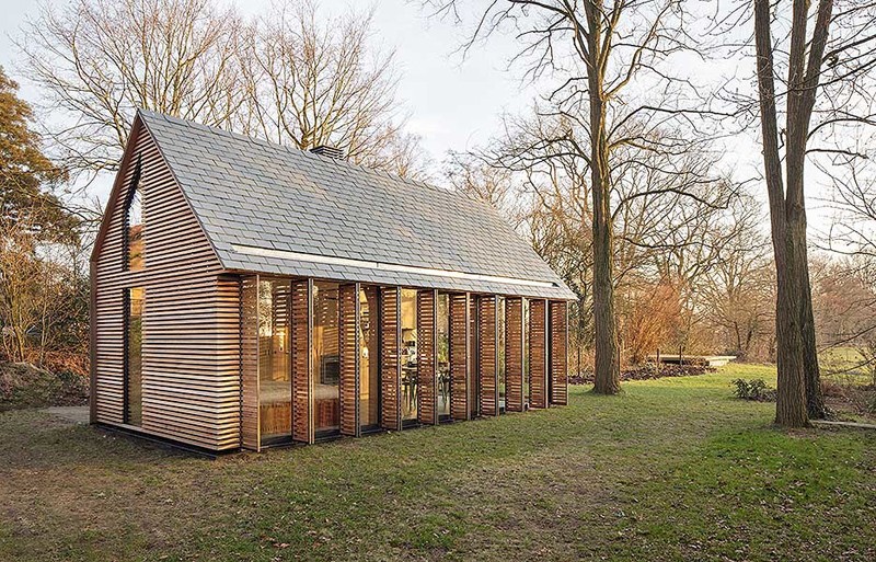 Zecc Architects, together with interior designer Roel Norel, have designed a small contemporary cottage in a rural area north of Utrecht in The Netherlands. 
