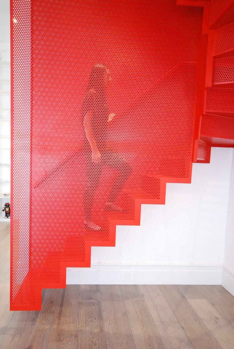 Hanging Red Stairs by Michaelis Boyd Associates