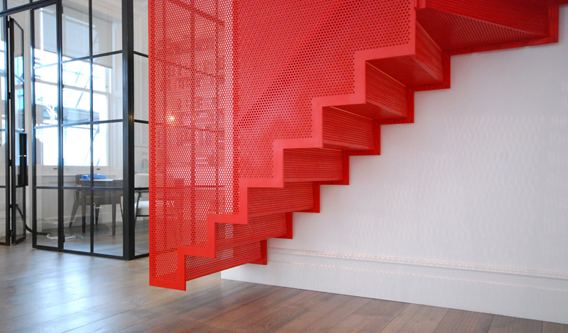 Hanging Red Stairs by Michaelis Boyd Associates