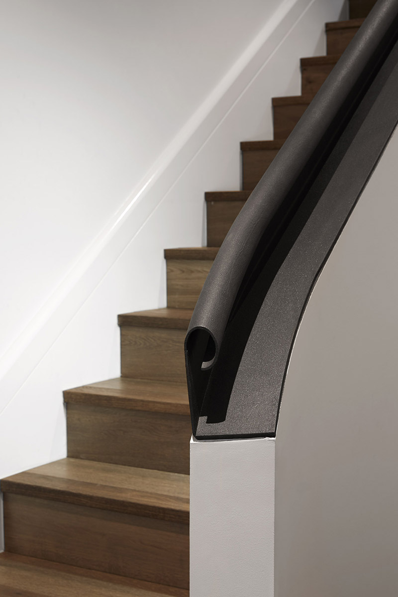 Design Detail: A Curved Steel Handrail // Cantebury Road Residence by b.e architecture