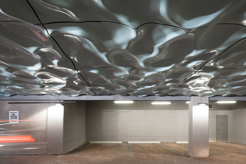 Paul Raff Studio Add Water-Like Sculpture To Ceiling Of Parking Area