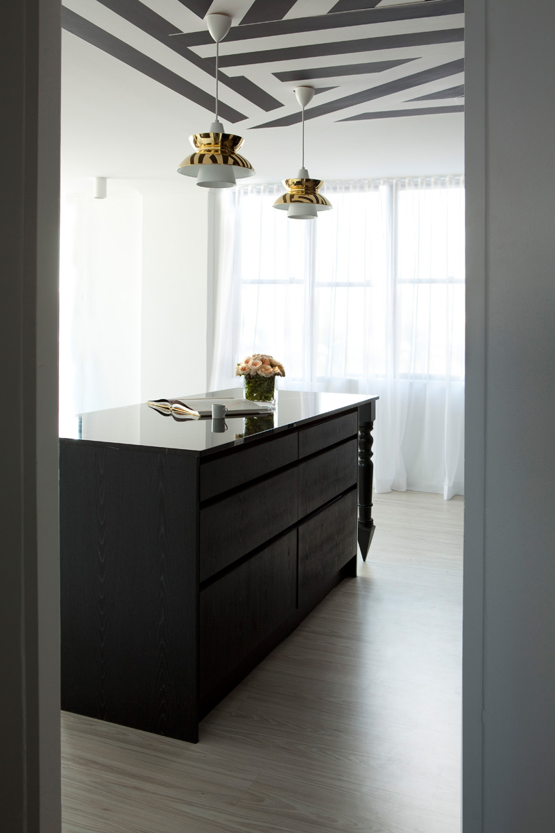 Black And White Graphics Help Define Areas Within This Apartment