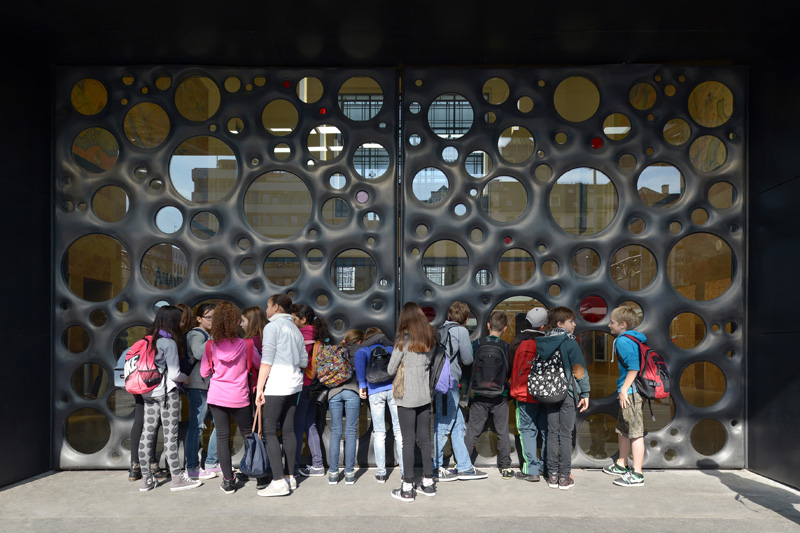 Sculptural Concrete Doors Welcome You To A Train Station In Geneva