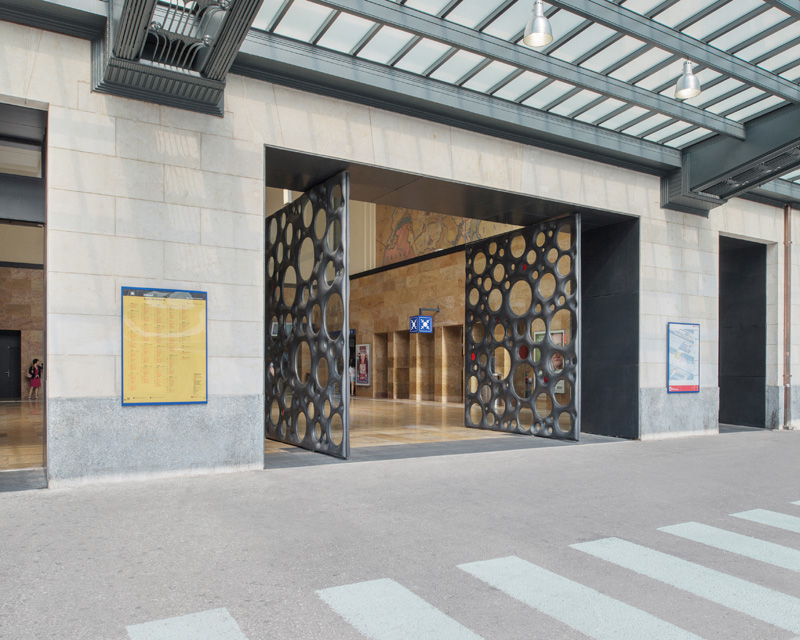 Sculptural Concrete Doors Welcome You To A Train Station In Geneva