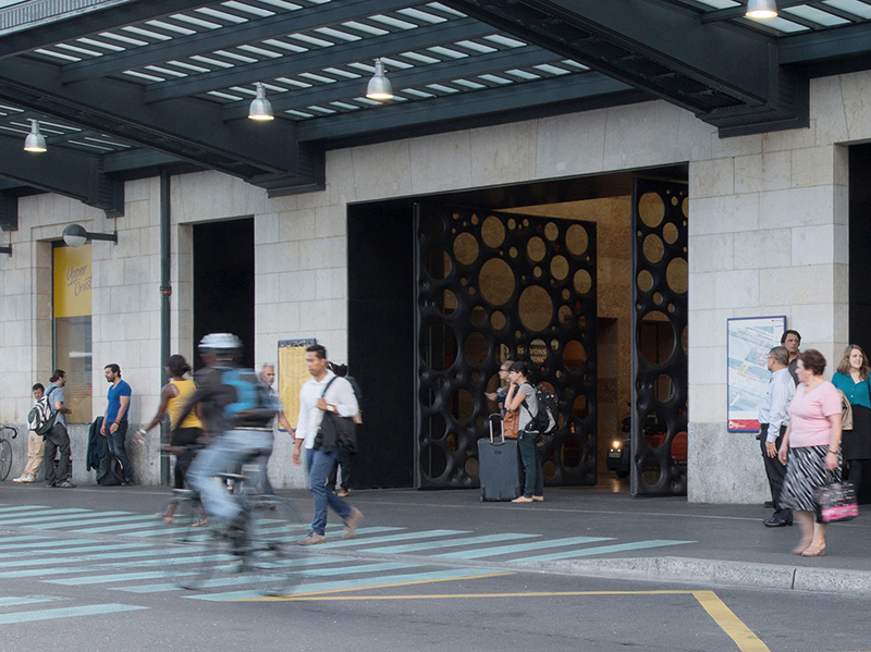 Sculptural Concrete Doors Welcome You To A Train Station In Geneva