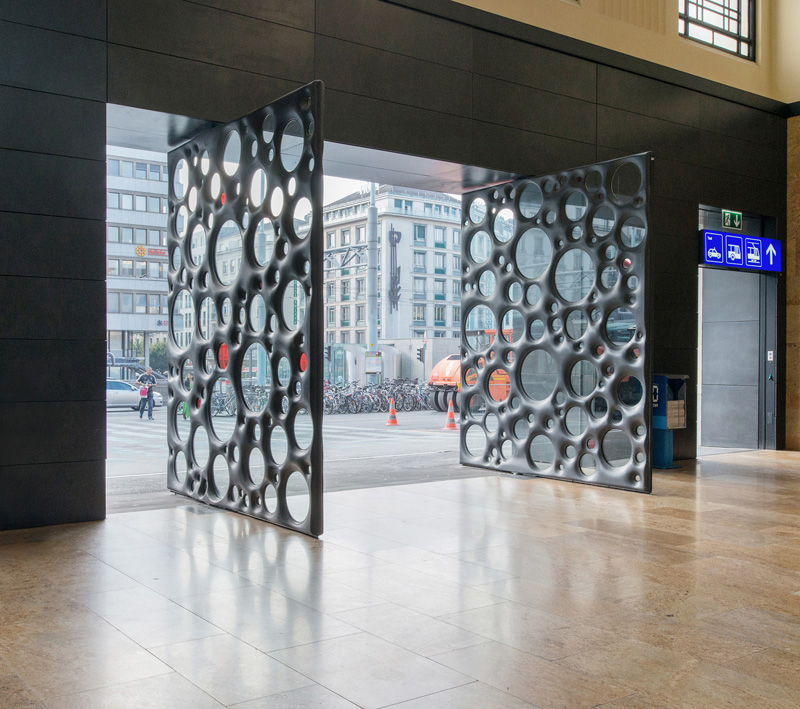 Sculptural Concrete Doors Welcome You To A Train Station In Geneva