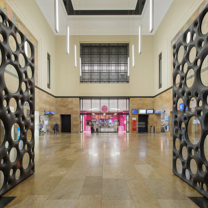 Sculptural Concrete Doors Welcome You To A Train Station In Geneva