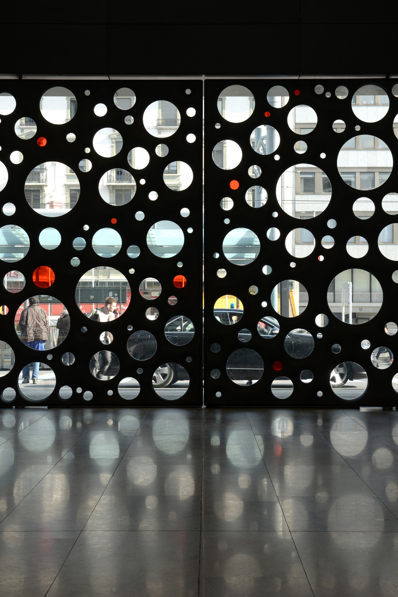 Sculptural Concrete Doors Welcome You To A Train Station In Geneva