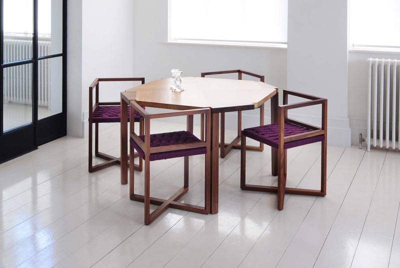 Woven Angled Seating Fits Snugly Into Notched Out Sections On This Table