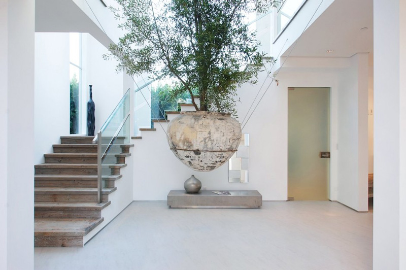 A large suspended planter catches your eye in this Los Angeles home