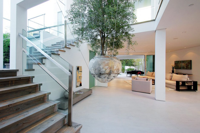 A large suspended planter catches your eye in this Los Angeles home