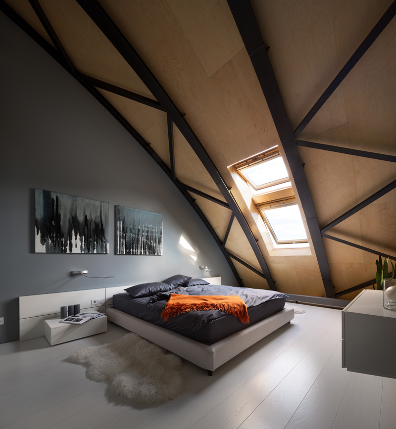 This modern apartment interior has a decorative ceiling element with hidden lighting. #ApartmentDesign #Ceiling #Lighting #Bedroom