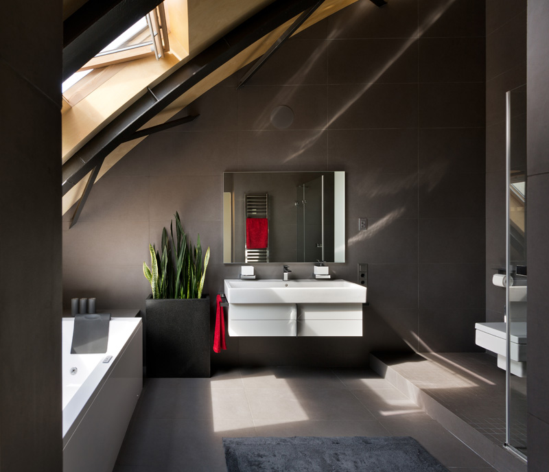 This modern apartment interior has a decorative ceiling element with hidden lighting. #ApartmentDesign #Ceiling #Lighting #Bathroom