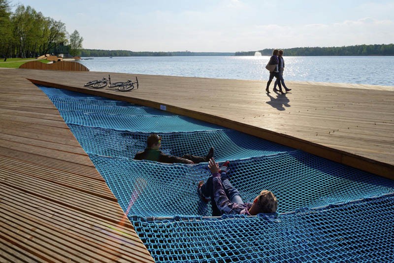 Nets for lying in become a unique attraction at this waterfront walkway