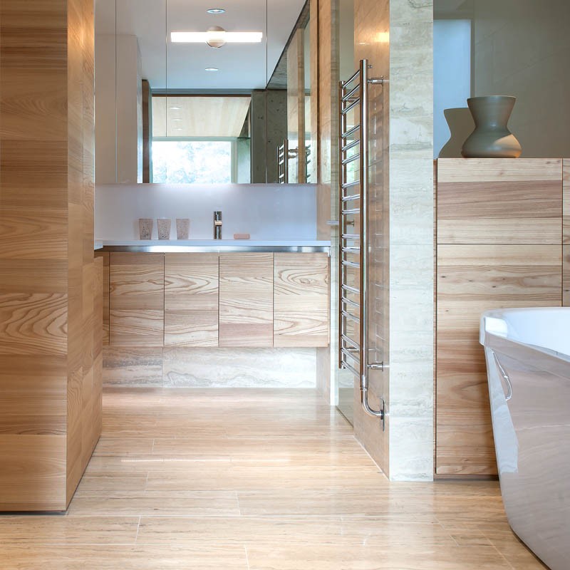 A contemporary bathroom with plenty of wood