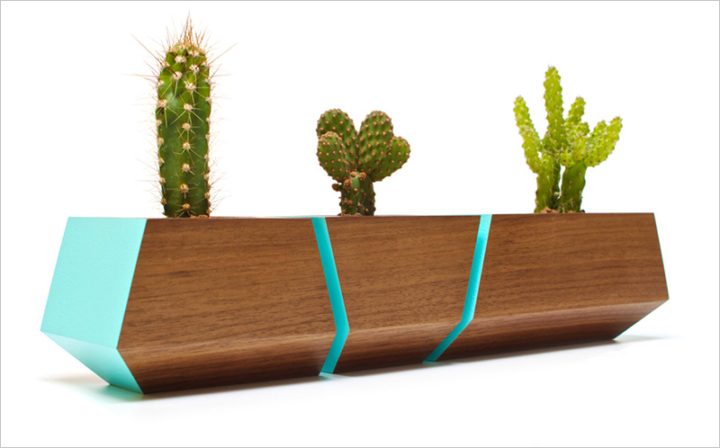 A modern Boxcar Succulent planter by Revolution Design House that includes bright blue accents. #Planters #SmallPlanters #Plants #Decor #HomeDecor #GiftIdea